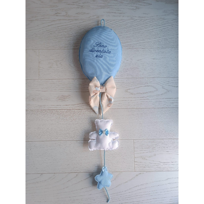 Pinchaglobo Artesanal Celeste con forma de Globo
