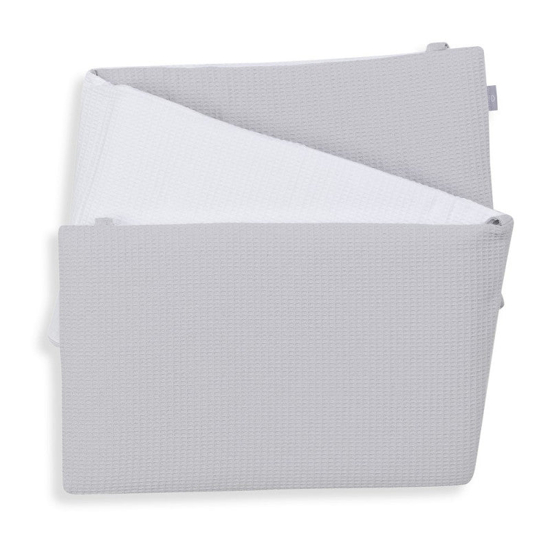 Protector de cuna reversible